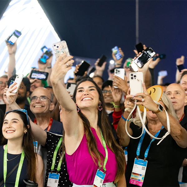 Attendees taking selfies at a tweetup