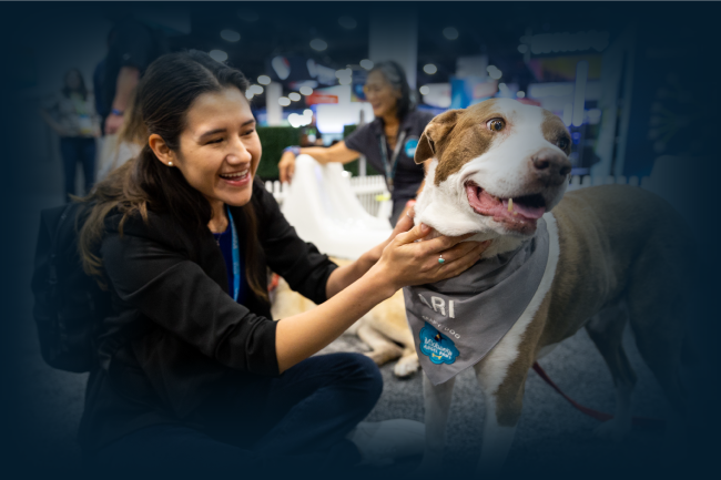 Attendee with a therapy dog at Cisco Live
